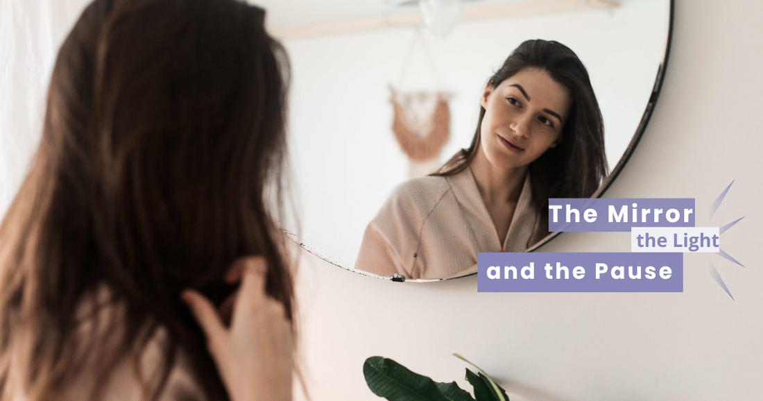 woman using lighted mirror for skincare in peaceful routine