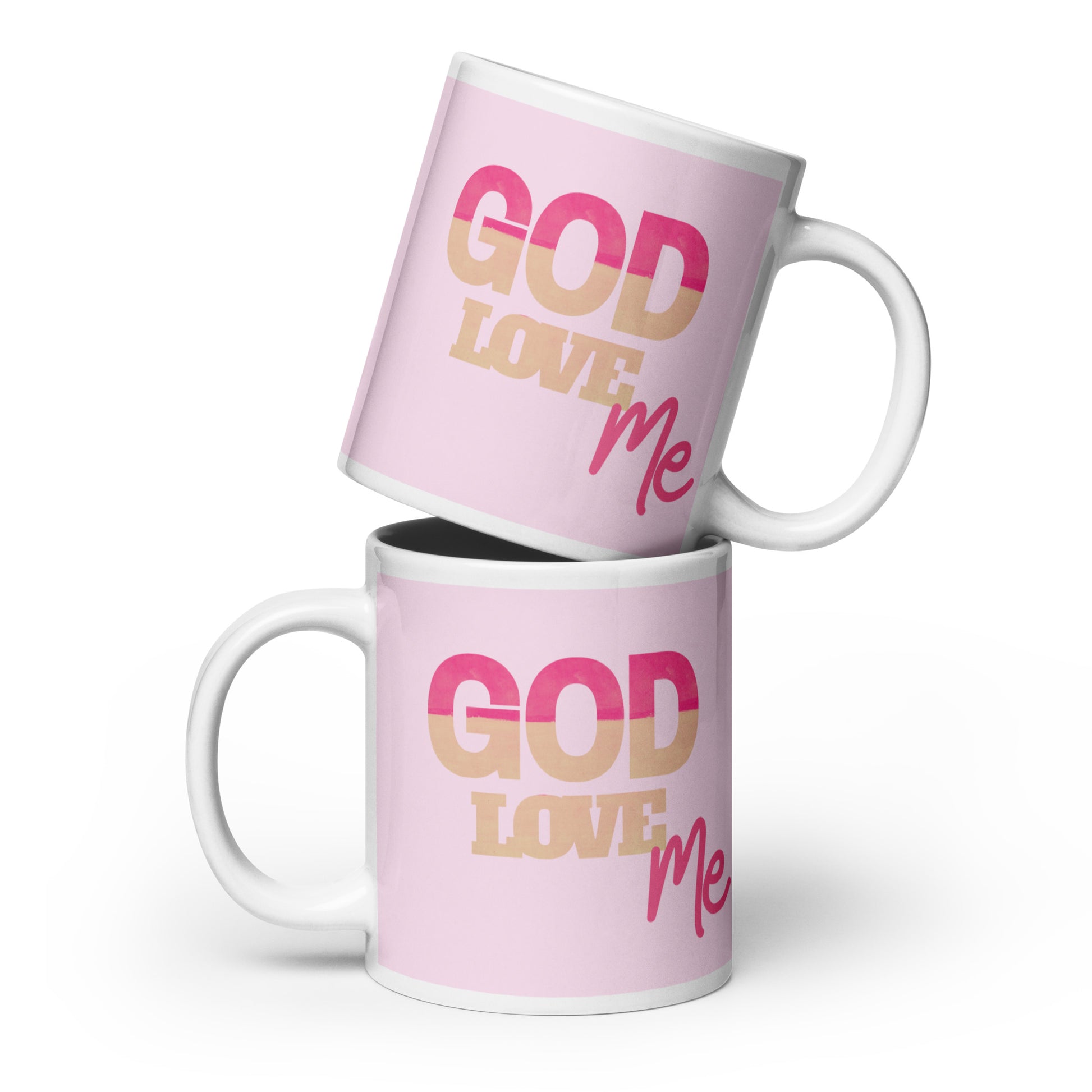 Two pink mugs with 'GOD LOVE ME' text on a white background