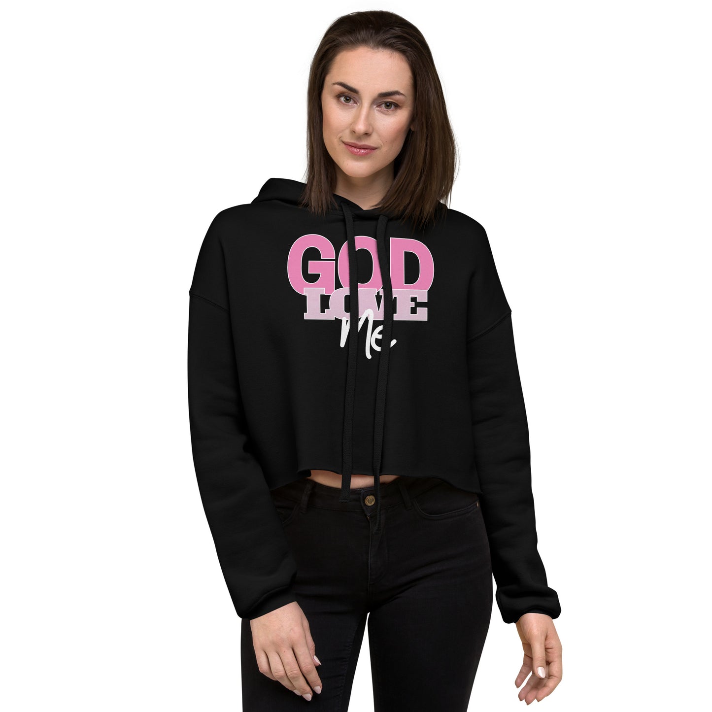 Woman wearing a black hoodie with pink and white text on a white background