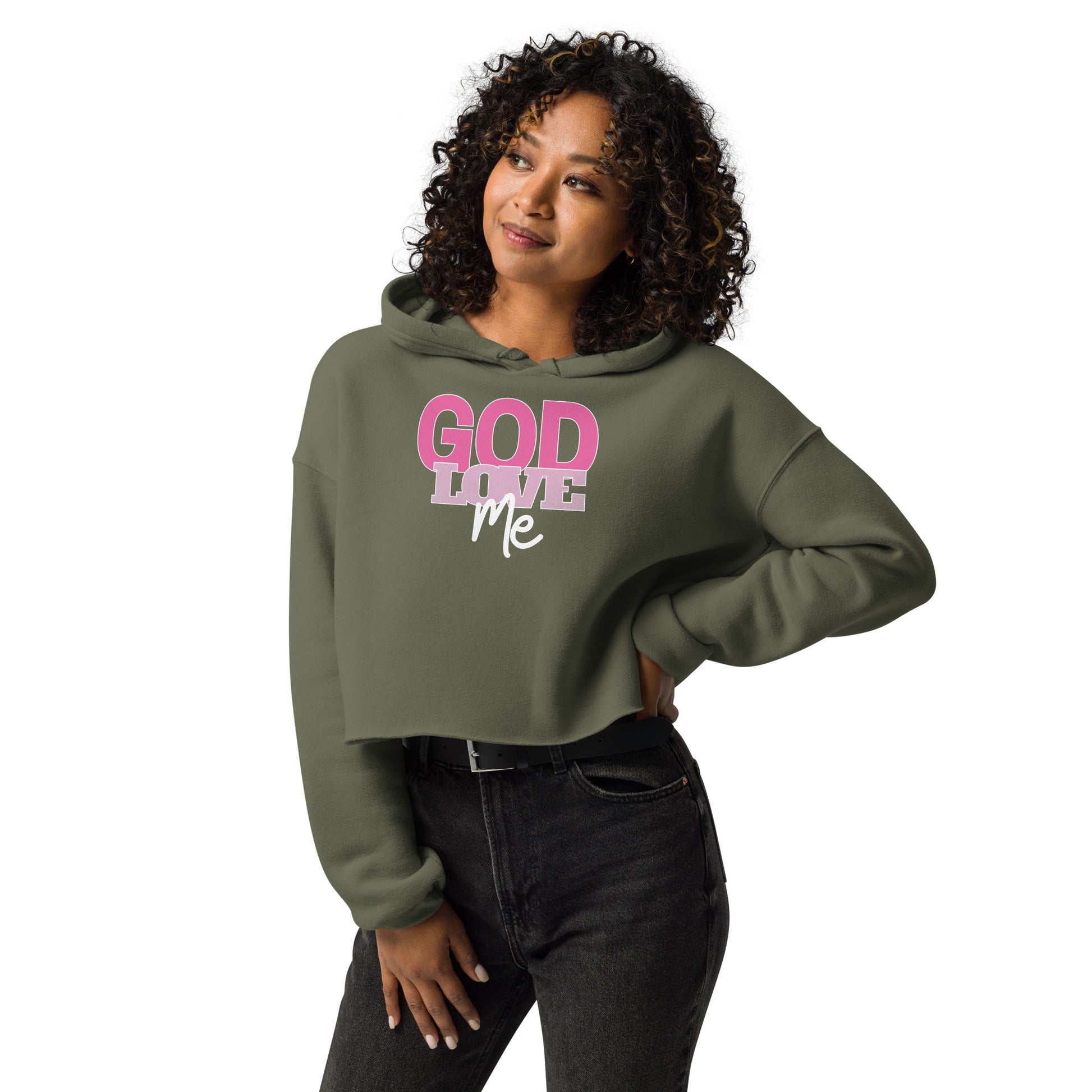 Woman wearing a green hoodie with 'GOD LOVE ME' text on a white background