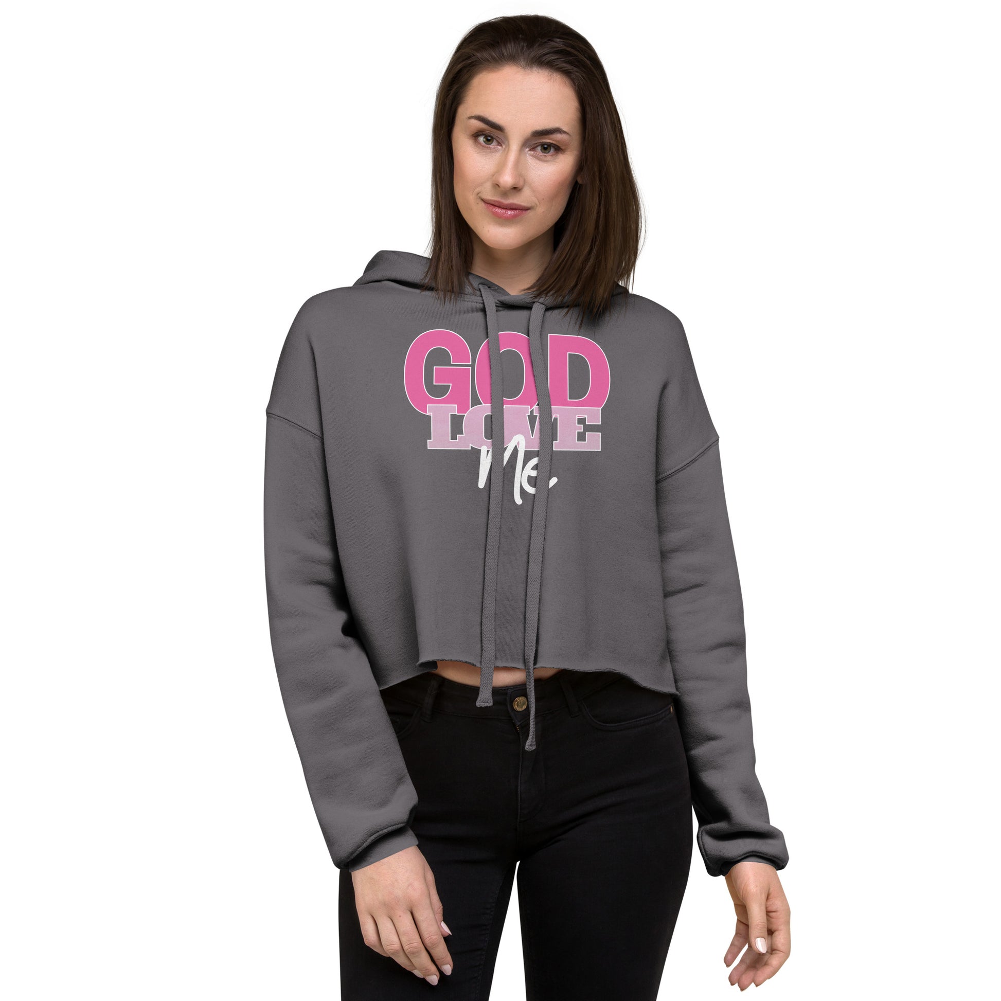 Woman wearing a gray hoodie with 'God Loves Me' text on a white background